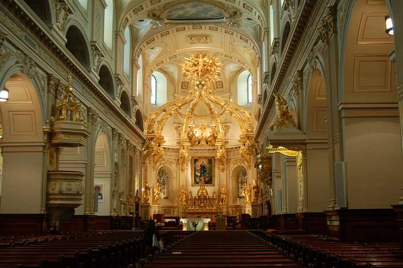 Canada East Tour 2006059.JPG - Badly damaged in the course of the British bombardment in 1759, the Basilique de Notre-Dame-de-Qu�bec was rebuilt over a period of nearly two centuries.  The forerunner of today's cathedral was New France's first parish church, built of stone in 1647, itself a replacement for a timber church erected by the Jesuits in 1633.  The church became a cathedral in 1657.